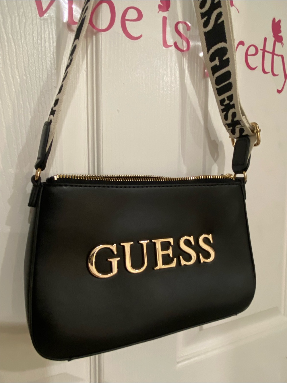 GUESS Black Shoulder Bag with Gold Logo and Branded Strap
